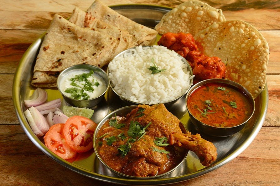 Try now our delicious Indian plates! only in Happy Corner