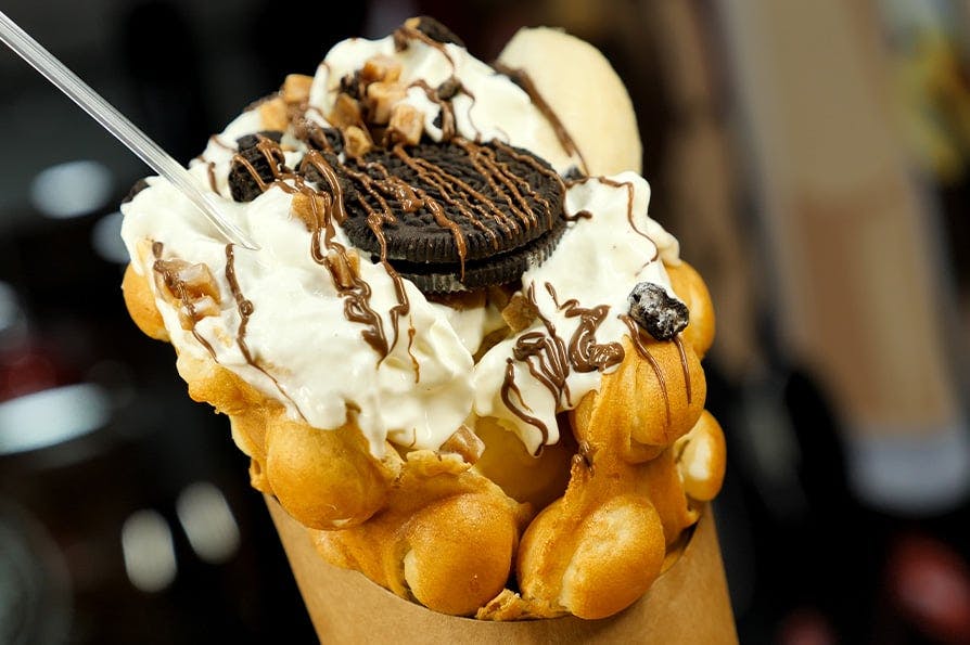 Indulge in the deliciousness of our crispy and delightful Bubble Waffle! Place your order now to enjoy.