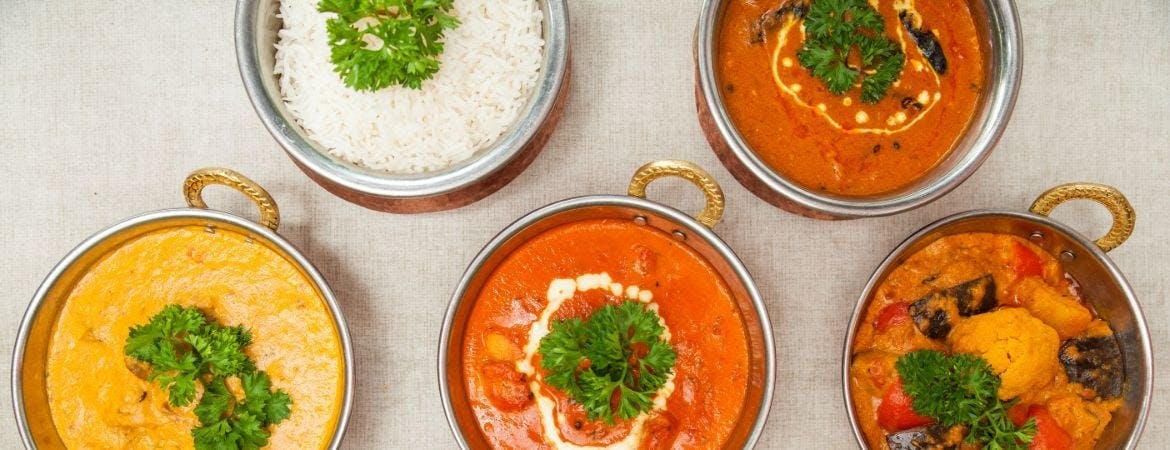  A selection of Indian curry dishes available for online ordering from Hen and Chickens in Derby