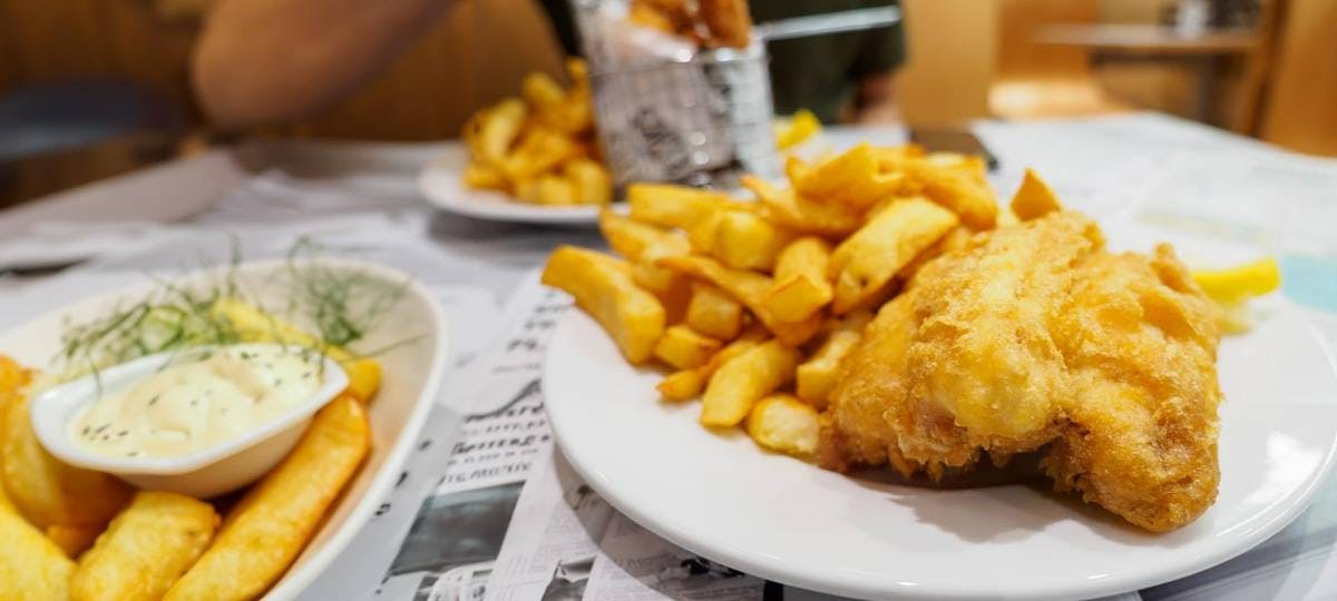 Fish and chips on a fancy plate