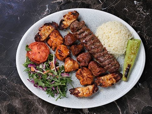 Chicken shish with rice and salad