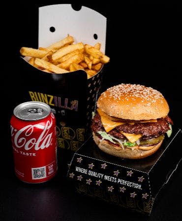 Order a burger with a side of chips and soft drink from Bunzilla (Chorlton-cum-Hardy)
