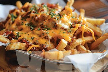 Loaded fries with melted cheese Wee India (Renfrew) 