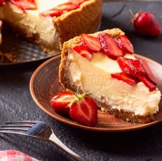 Portion of cheesecake with strawberries from Perico Dessert Box (Tipton)