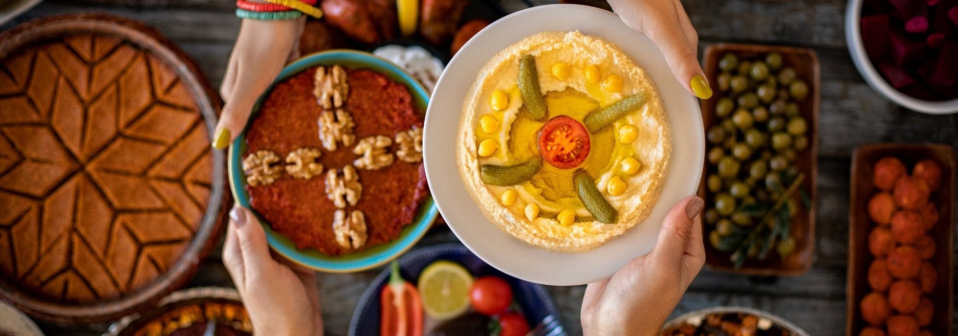 Traditional Syrian food from Damascus (Calne) shared over a table