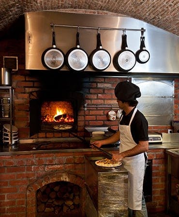 Our authentic wood fired oven ensures perfect pizza everytime! Order from Pizzaholics today