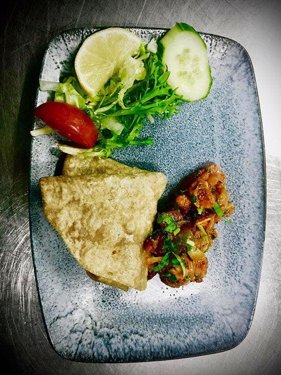 Homemade samosa served with salad at our Indian Takeaway in Fairford