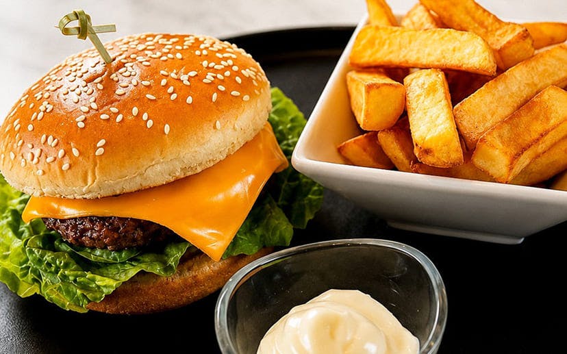 Tasty burger and chips available to order at Finches Table Ordering
