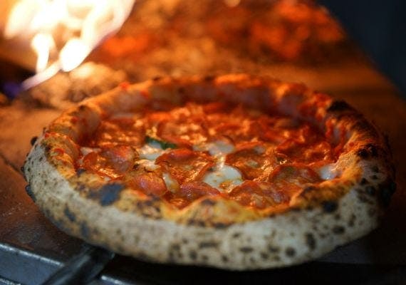 A delicious pizza prepared in the oven at Basil Pizza in Watford