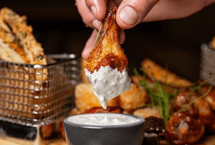 Tasty chicken wings available to order from Mr Tees in Guildford