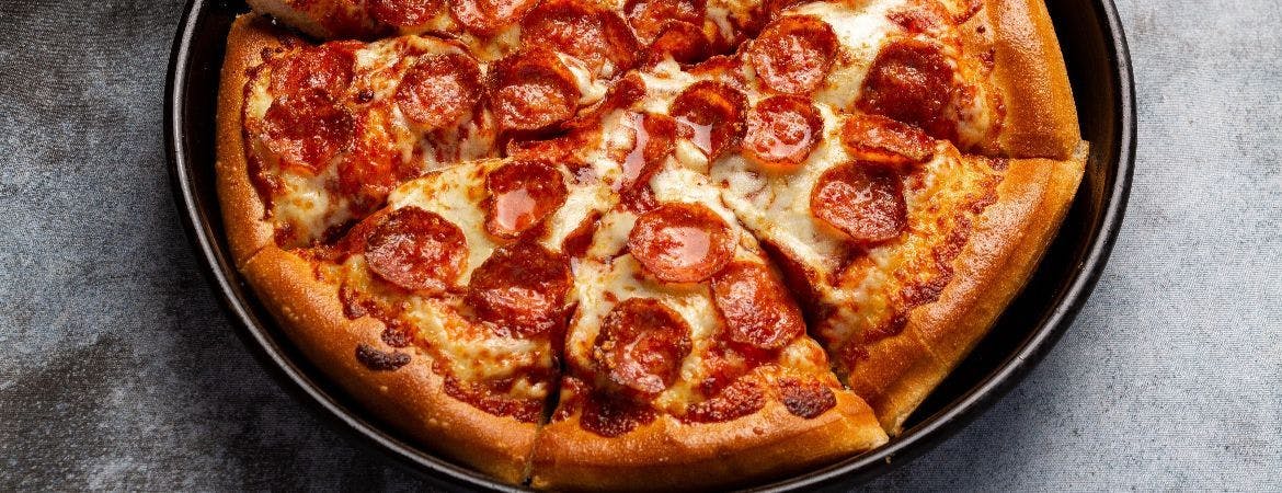 Pepperoni pizza cooked at Deep Pan Pizza, the best Pizza Takeaway in Clapton