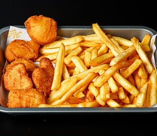 Chicken nuggets and chips served at Mutleys (Barking)