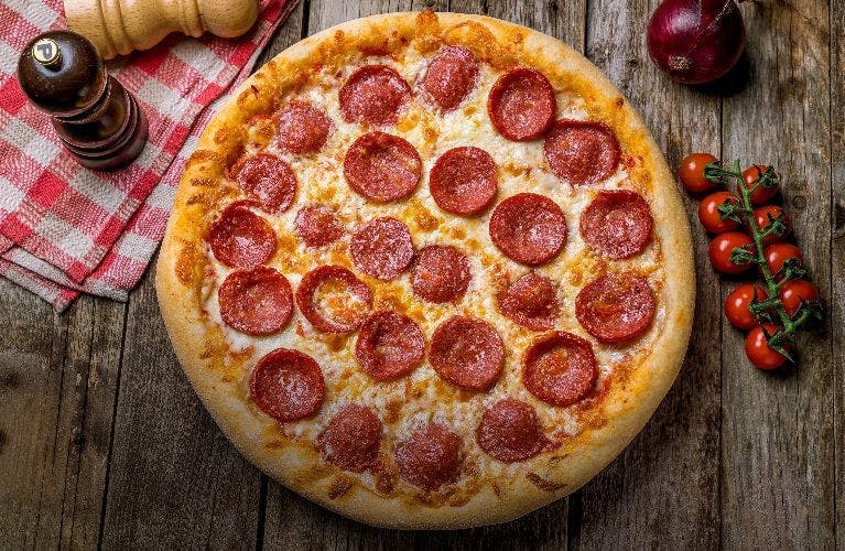 Fresh pepperoni pizza served at our Italian Restaurant and Takeaway in St Albans