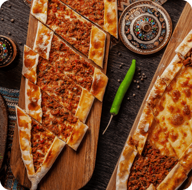 Thin, crispy lahmacun topped with flavourful minced meat at Dubai Restaurant