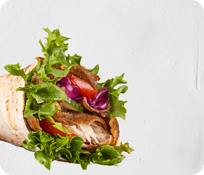 Order a doner wrap from the tempting menu available at Shaw Kebab House (Swindon)