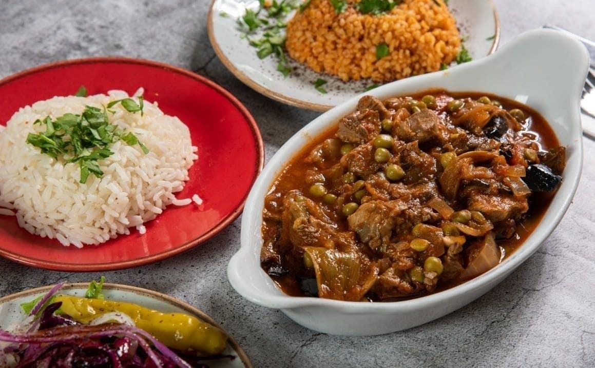 Delicious chicken stew, rice and vegetables served at Levante Lewisham (Restaurant)