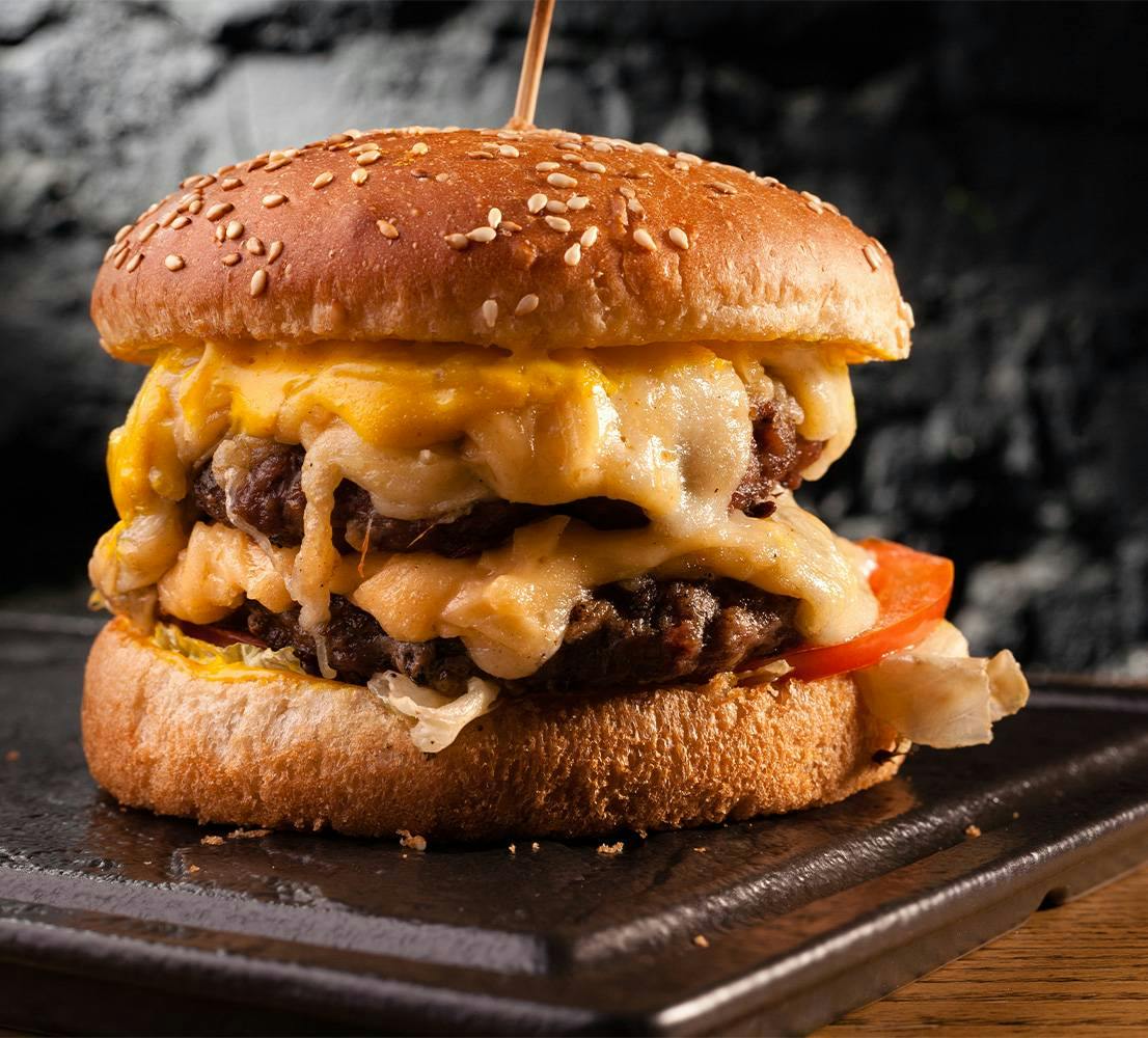 Delight yourself with the magic touch of our cheeseburgers